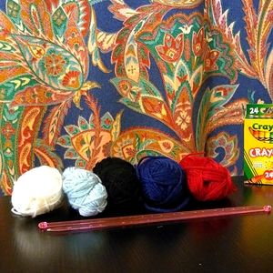 5 big yarns and two knitting needles